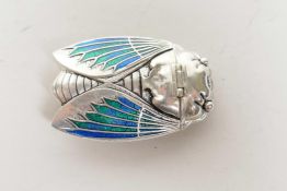 A silver plated and enamel vesta case in the form of a cicada, 2" long