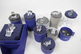Ten boxed Swarovski Crystal animals and birds including koala, grizzly bear with fish, teddy