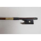 A French, silver mounted violin bow by and stamped 'A. Lamy A Paris', the stick round, the ebony