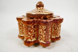 A Hispano-Moresque C18th stem lustre vase or burner with lid, with distinctive copper lustre and