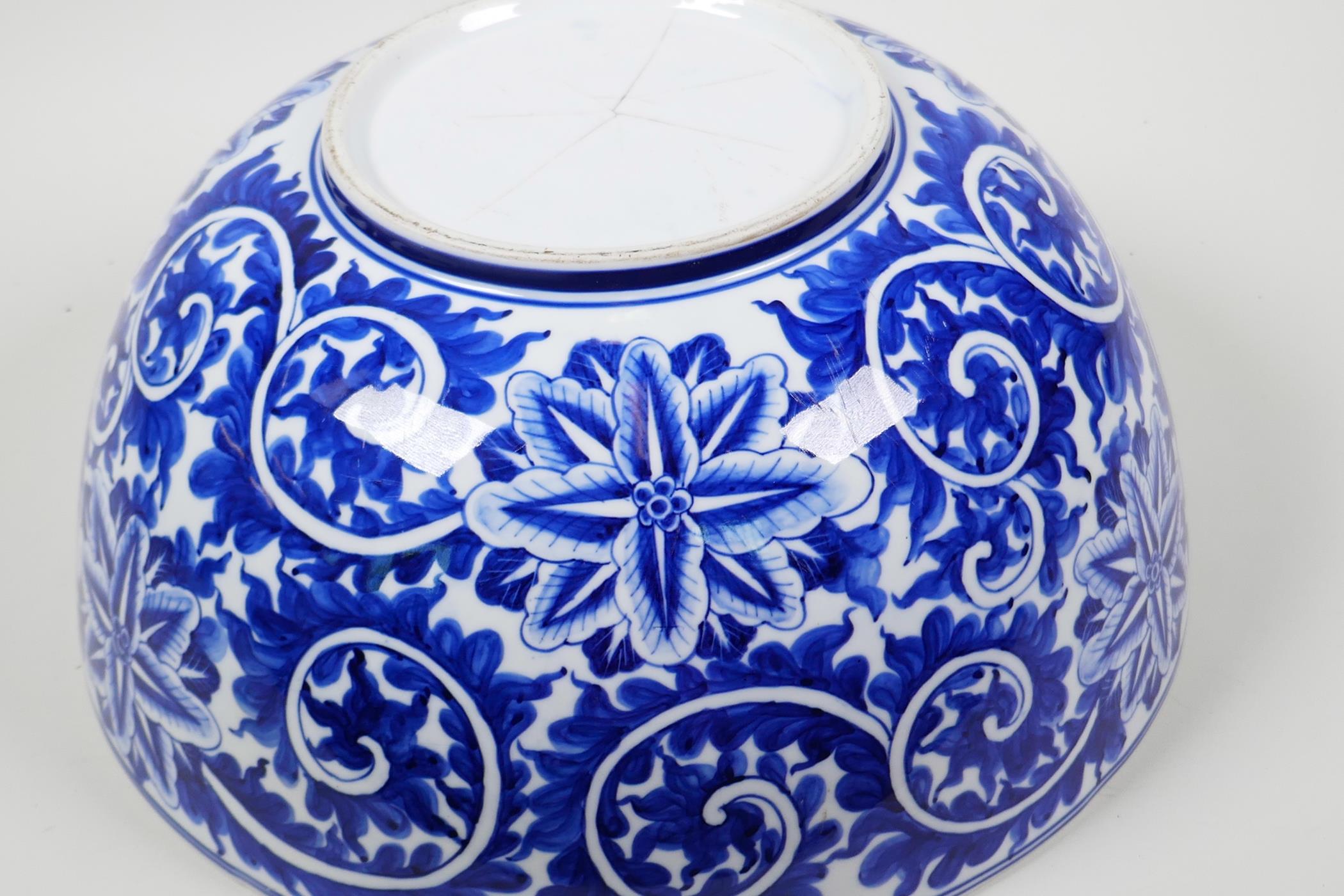 A large blue and white porcelain bowl with scrolling floral decoration, 14" diameter - Image 4 of 5