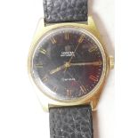 A gentleman's vintage Omega 'Automatic' wristwatch with black dial and gilt double line batons on