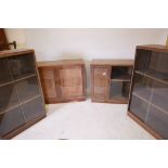 A pair of limed oak 'Minty' glazed bookcases, 40" x 16" x 31", and another pair