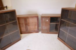 A pair of limed oak 'Minty' glazed bookcases, 40" x 16" x 31", and another pair