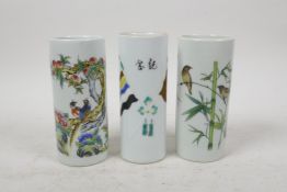 Three Chinese polychrome porcelain spill vases decorated with birds, flowers and flags, character