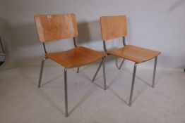 A pair of contemporary bent ply and steel dining chairs, 30½" high