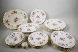 A large quantity of early C20th Royal Crown Derby 'Posies' porcelain part-dinner service, hand