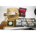 A quantity of miscellaneous items including Wedgwood plaque, box of stamps, postcards in album, a