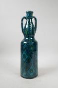 A Liberty style 1920s pottery two handled bottle/vase, 14" high, A/F losses
