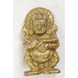 A small Sino-Tibetan figure of an angry deity, 2½" high