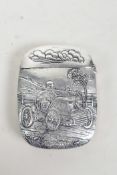 A silver plated vesta case with repousse automotive decoration, 2" x 1½"