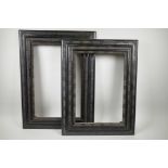 Two Dutch style ebonised moulding frames, with ripple decoration, rebates 12" x 18½" and 17" x 12"