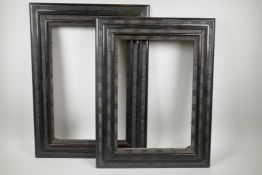 Two Dutch style ebonised moulding frames, with ripple decoration, rebates 12" x 18½" and 17" x 12"