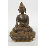 A gilt spelter figure of Buddha seated in meditation on a lotus throne, 6" high