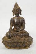 A gilt spelter figure of Buddha seated in meditation on a lotus throne, 6" high