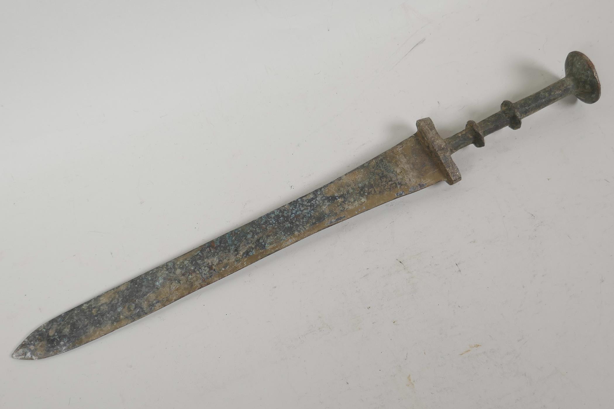 A verdigris bronze dagger, 15" long