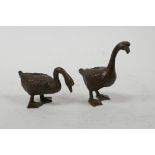 Two Chinese bronzed metal ducks, 2½" high