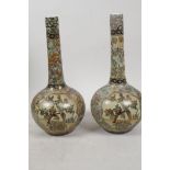 A pair of Japanese Satsuma bottle vases with applied silver wire banding, and painted with birds and