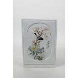 A Chinese porcelain brush pot with polychrome enamelled decorative panels depicting birds, carp