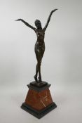 An Art Deco style bronze of a dancing semi-nude woman in a headress, after D.H. Chiparus, 22" high