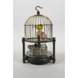A Chinese brass automaton birdcage clock, 6½" high