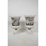 A pair of Naples Capodimonte porcelain urns having embossed decoration of Bacchanalian bathers