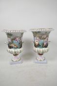 A pair of Naples Capodimonte porcelain urns having embossed decoration of Bacchanalian bathers