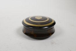 A gold inlaid tortoiseshell circular snuff box, 2½" diameter