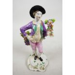 A late C19th Spode Copelands china figure of 'The Boy Newton', a young man holding an apple in