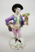 A late C19th Spode Copelands china figure of 'The Boy Newton', a young man holding an apple in