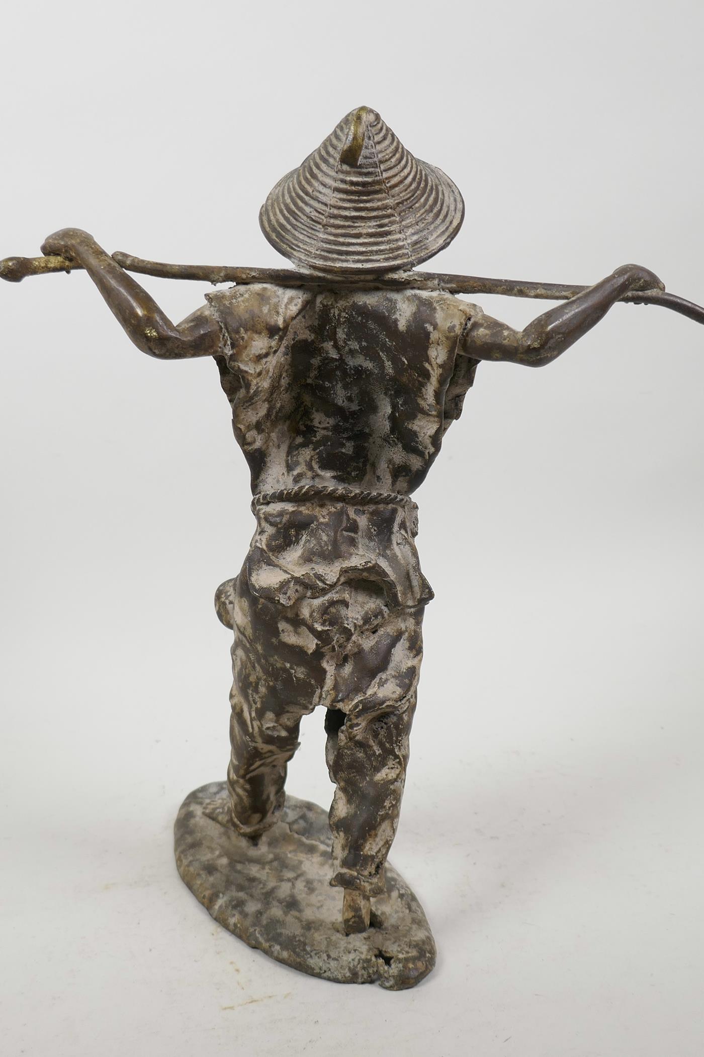 A Chinese stylised bronze figure of a fisherman, 13" high - Image 4 of 5