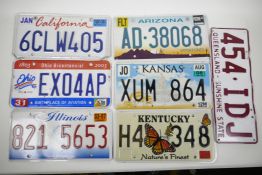 Six American state number plates, California, Arizona, Ohio, Kansas, Illinois and Kentucky, together