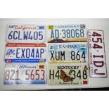 Six American state number plates, California, Arizona, Ohio, Kansas, Illinois and Kentucky, together