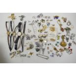 A quantity of costume jewellery, some silver, to include necklaces, brooches, cufflinks, watches,