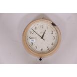 A Smith's eight day Bakelite wall clock, spring movement, painted case, appears in working order, 9"