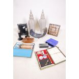 A Vera Wang picture frame and matching candlesticks, a gilt photo frame, Tom Dixon stapler,