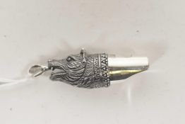 A 925 silver whistle in the form of a wolf's head, 1½" long