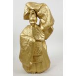 A gilt metal figure of a Japanese Noh actor dressed as a Shinto priest, 13½" high