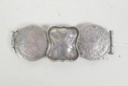 An unusual early C20th belt buckle constructed from coins decorated with a Maltese cross, 4" x 1½"