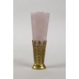 A rose crystal handled gilt metal seal with a musical note motif, 3½" long