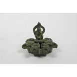 An Indian bronzed metal tikka spice box with Ganesh decoration, 2½" diameter