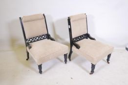 A pair of Victorian ebonised aesthetic parlour chairs