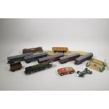 A collection of Hornby OO, to include a locomotive, rolling stock and terrain, together with two