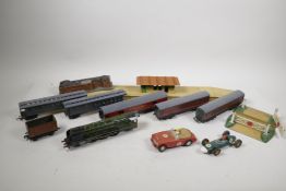 A collection of Hornby OO, to include a locomotive, rolling stock and terrain, together with two