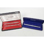 A Sheaffer fountain pen together with a Parker ball point pen and pencil set