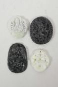 Four Chinese carved hardstone pendants decorated with auspicious animals and Buddha, largest 2"