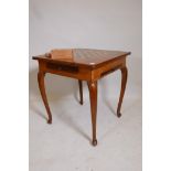 A walnut games table with chequerboard top and two drawers, complete with a set of HP Gibson wood