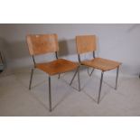 A pair of contemporary bent ply and steel dining chairs, 30½" high