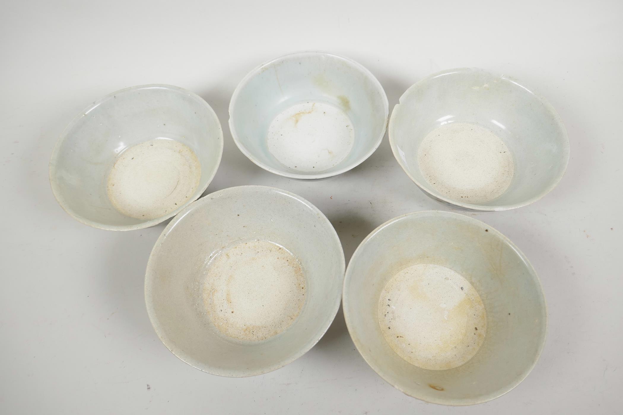 Five Chinese Tek Sing blue and white porcelain bowls, three with Nagel Auctions label to base, 5½" - Image 3 of 6