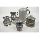 A collection of C18th pewter vessels including a large lidded tankard, English c.1780, with double